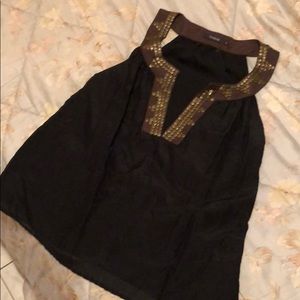 Flowy blouse with beautiful neckline detailing!